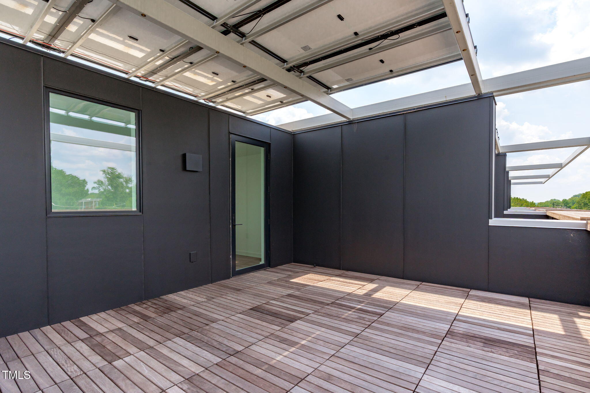 511 South Bloodworth Street, Unit 101 Raleigh, NC 27601 - Photo 29 of 51 a bedroom with a bed and a window