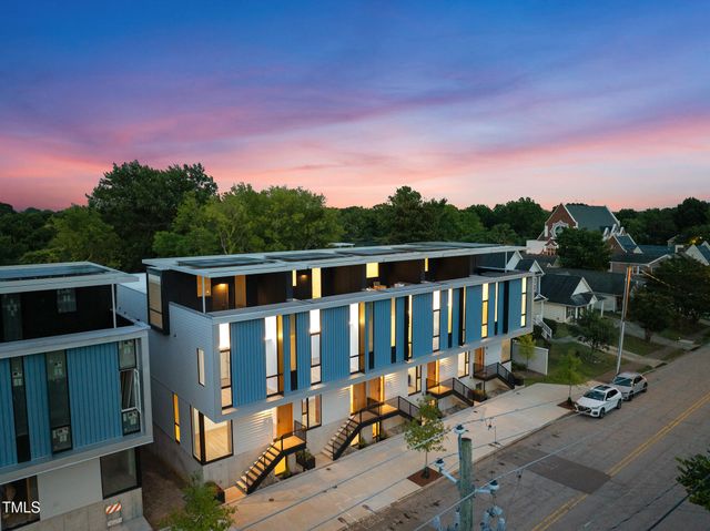 an aerial view of a city with lots of buildings