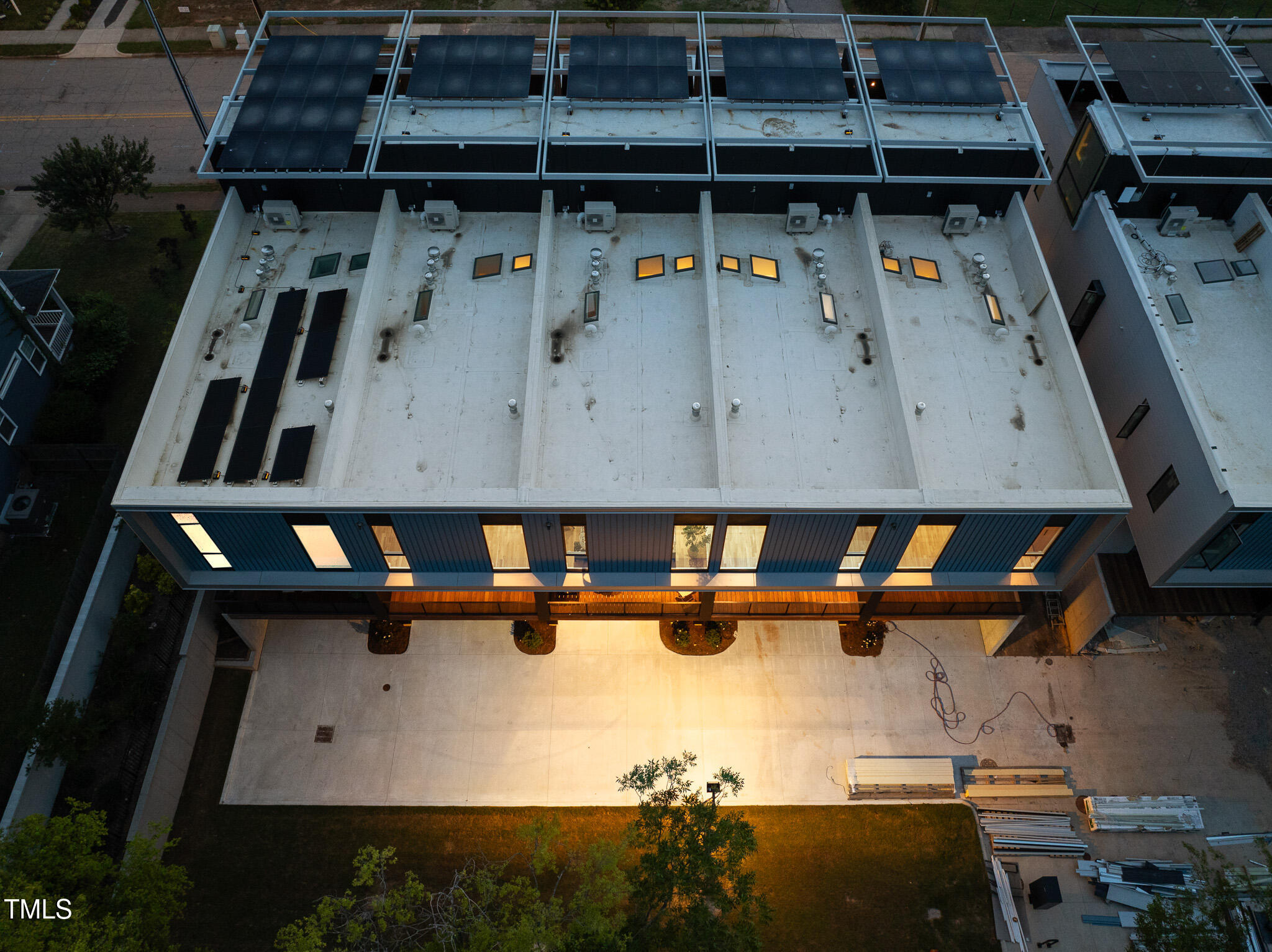 511 South Bloodworth Street, Unit 101 Raleigh, NC 27601 - Photo 38 of 51 an aerial view of residential houses with outdoor space