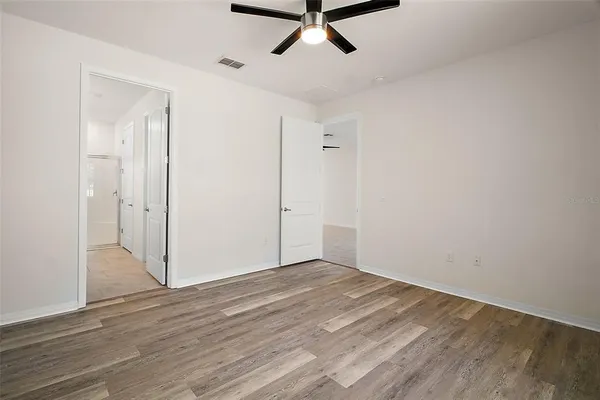 a bathroom with a granite countertop sink mirror and double