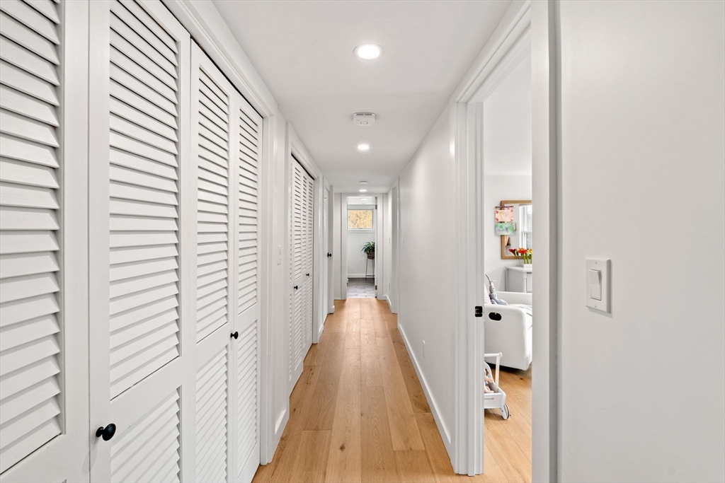 8 R Rolfe's Lane Newbury, MA 01951 - Photo 28 of 42 a view of a hallway with wooden floor and staircase
