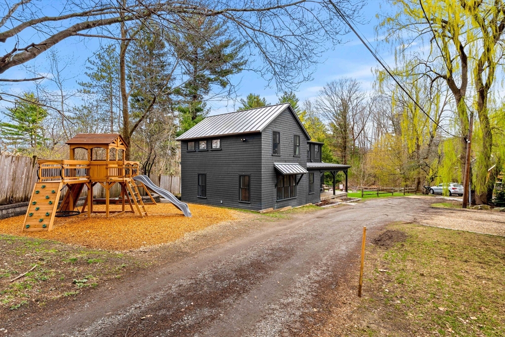 8 R Rolfe's Lane Newbury, MA 01951 - Photo 3 of 42 a view of a house with basketball court