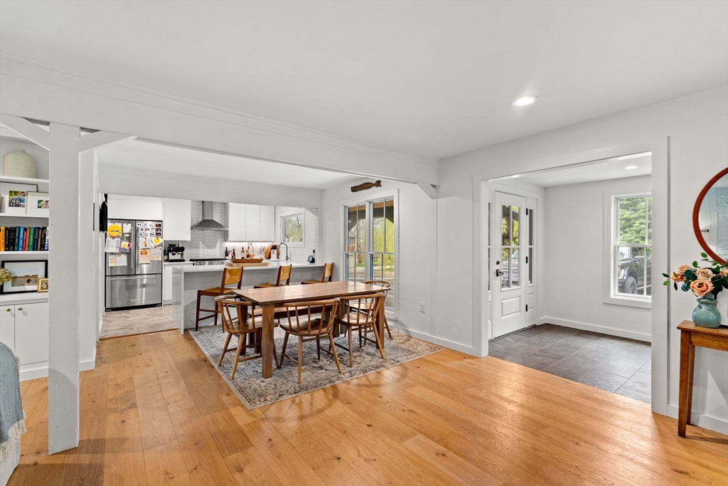 8 R Rolfe's Lane Newbury, MA 01951 - Photo 7 of 42 a view of a dining room with furniture and a livingroom