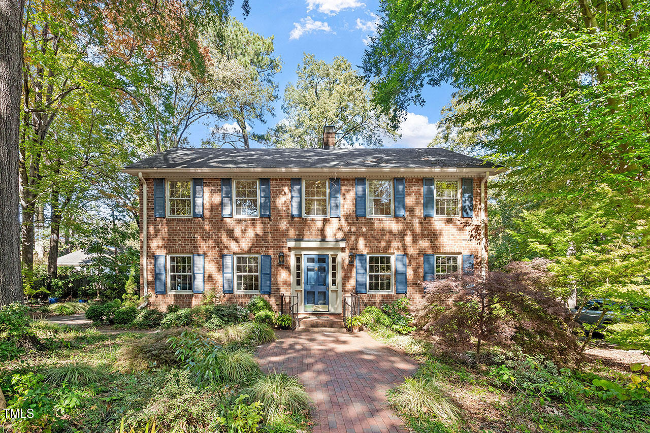 front view of house with a garden