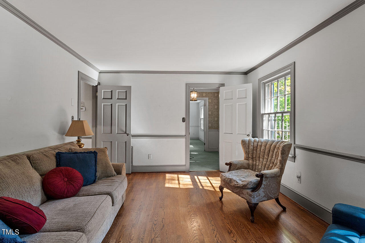 3408 Caldwell Drive Raleigh, NC 27607 - Photo 23 of 46 a living room with furniture and a window