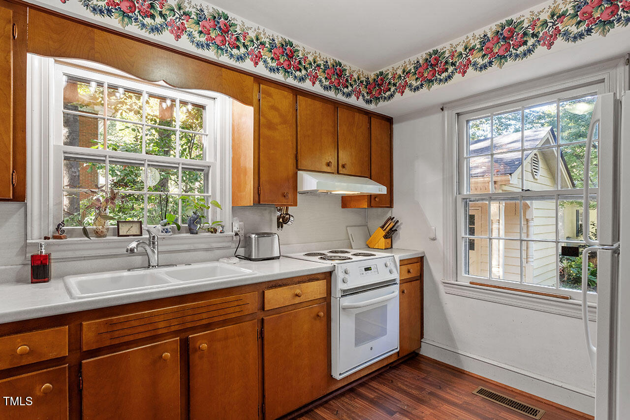 3408 Caldwell Drive Raleigh, NC 27607 - Photo 27 of 46 a kitchen with sink and window