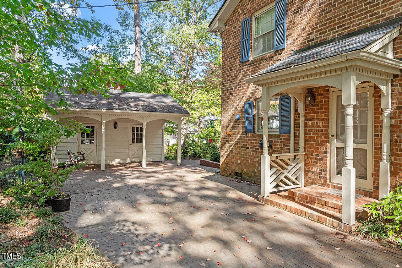 3408 Caldwell Drive Raleigh, NC 27607 - Photo 4 of 46 front view of a house with a porch