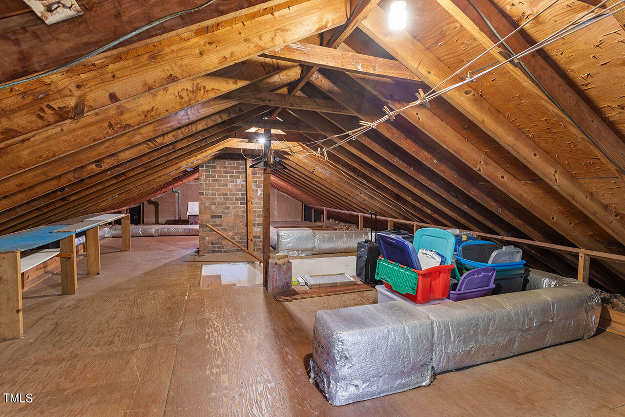 3408 Caldwell Drive Raleigh, NC 27607 - Photo 45 of 46 a bedroom with furniture and a ceiling fan