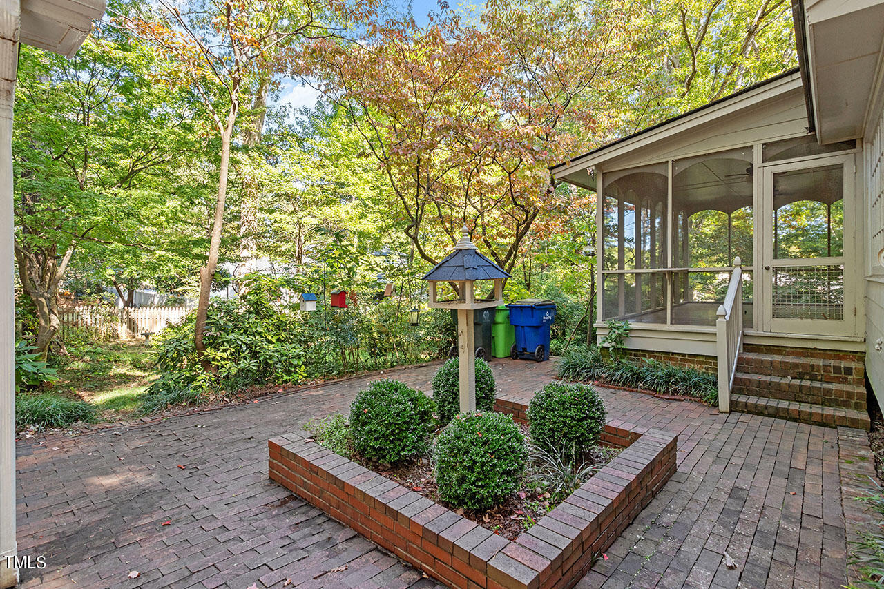 3408 Caldwell Drive Raleigh, NC 27607 - Photo 5 of 46 a front view of a house with garden