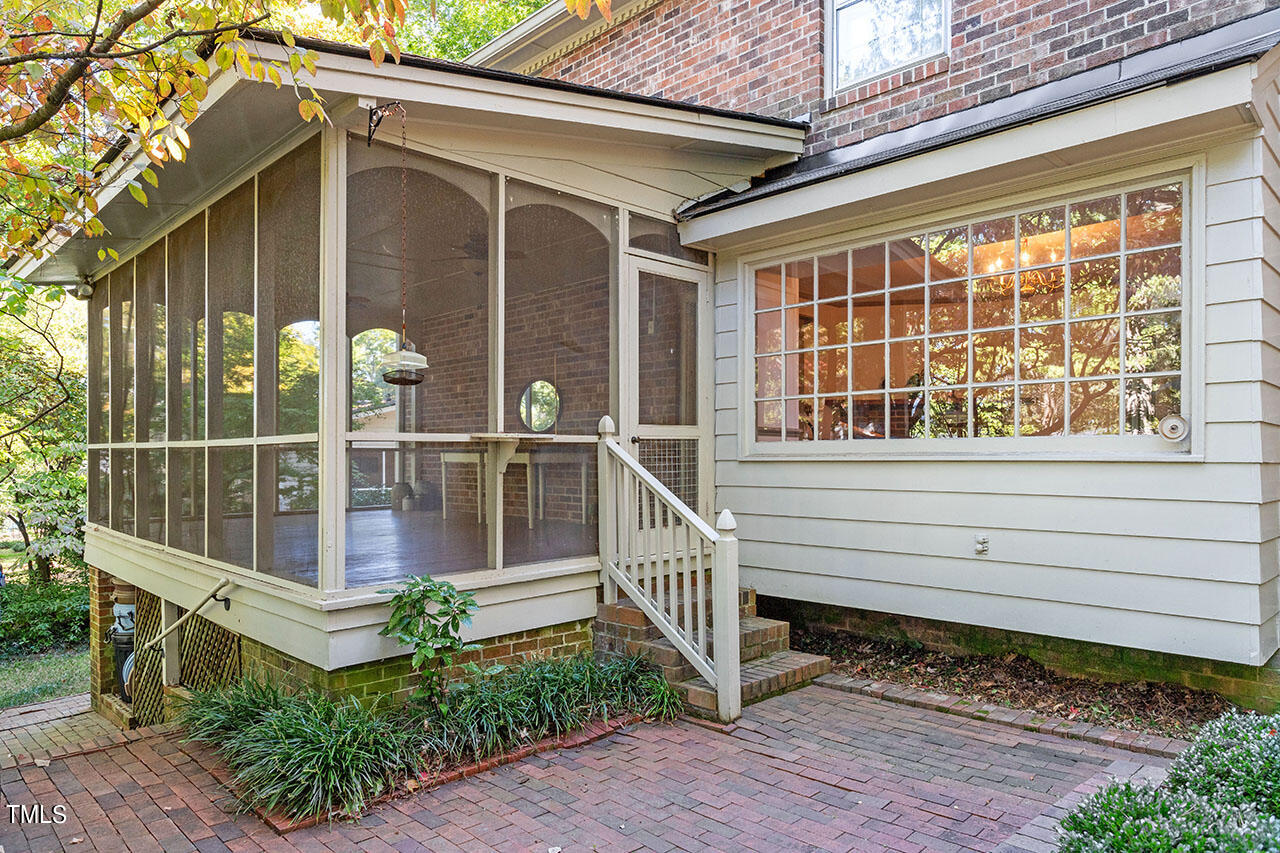 3408 Caldwell Drive Raleigh, NC 27607 - Photo 6 of 46 a front view of a house with a yard