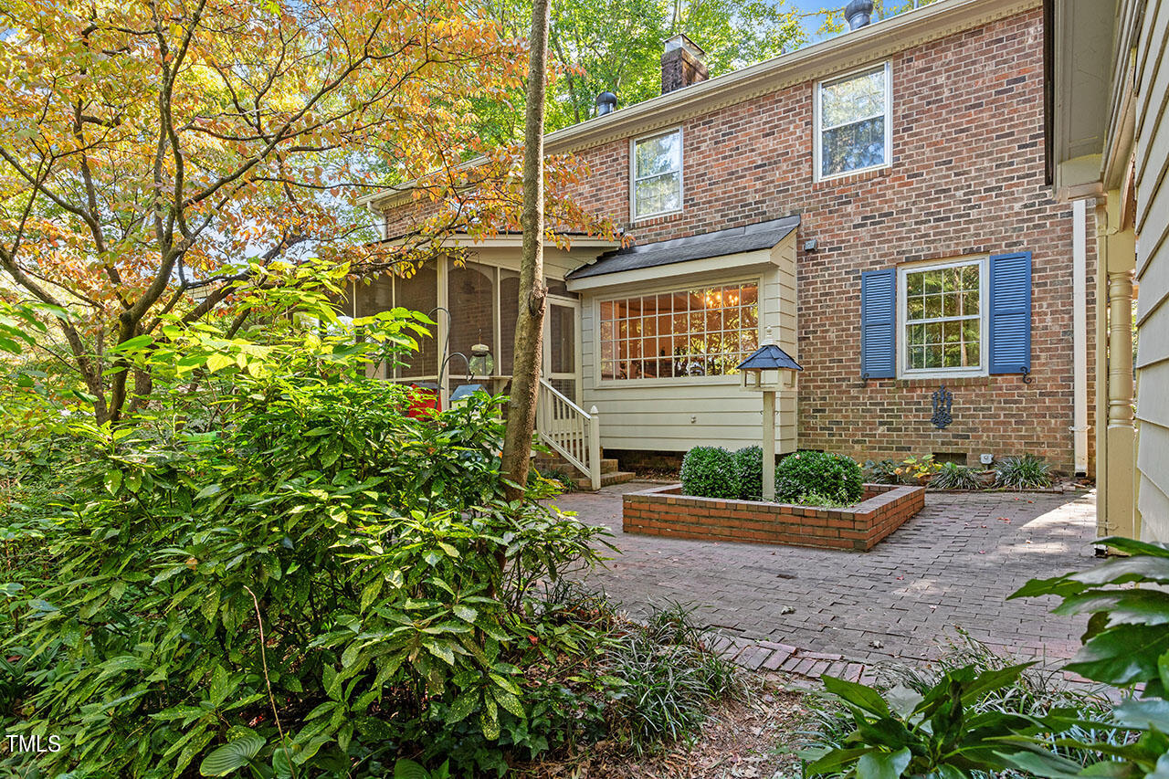 3408 Caldwell Drive Raleigh, NC 27607 - Photo 8 of 46 a front view of a house with garden