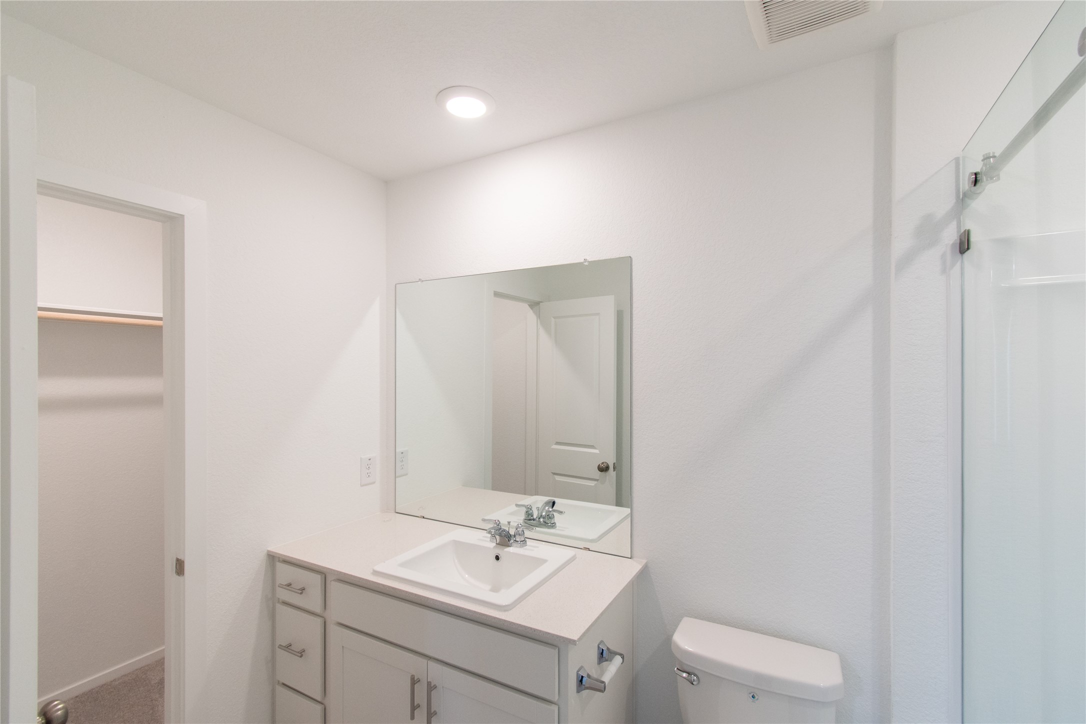 31432 Moore Road Magnolia, TX 77354 - Photo 17 of 26 a bathroom with a sink toilet and mirror