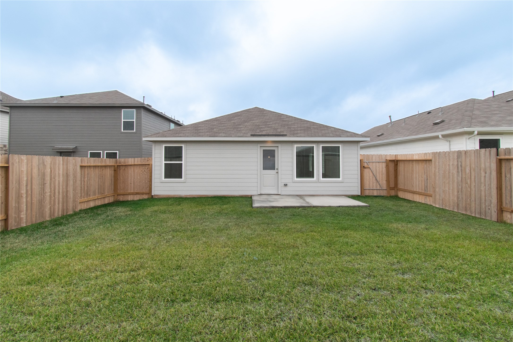 31432 Moore Road Magnolia, TX 77354 - Photo 25 of 26 a front view of a house with a garden