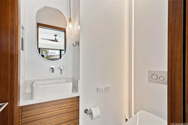 a bathroom with a bathtub and a sink