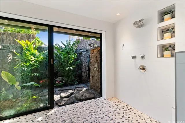 a window with yard in the back