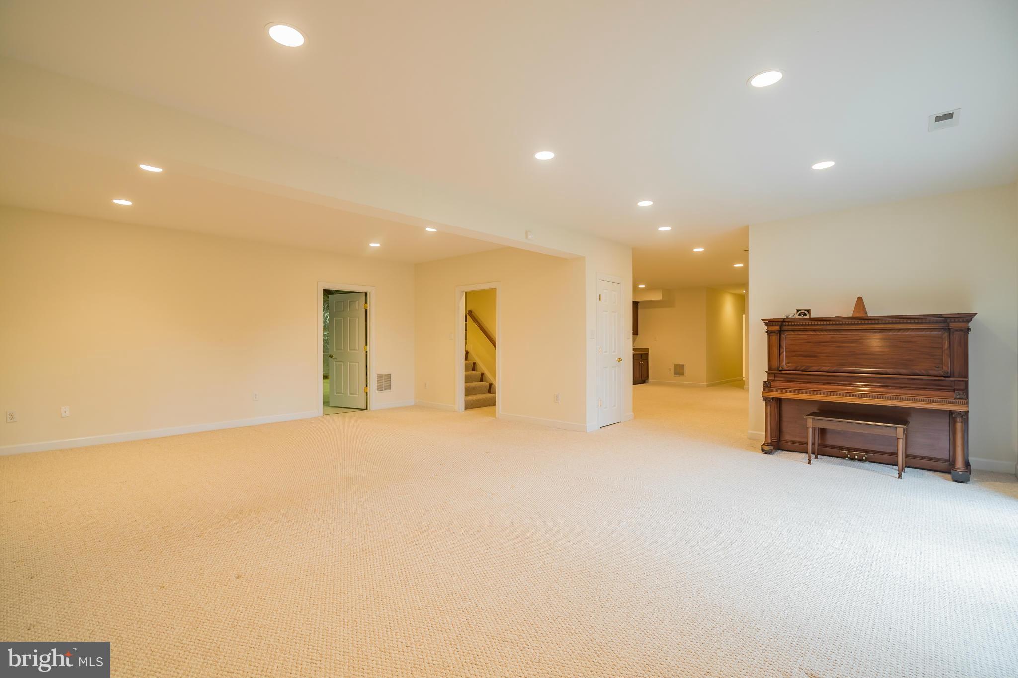 9504 Emory Grove Road Gaithersburg, MD 20877 - Photo 24 of 30 a view of empty room with wooden floor