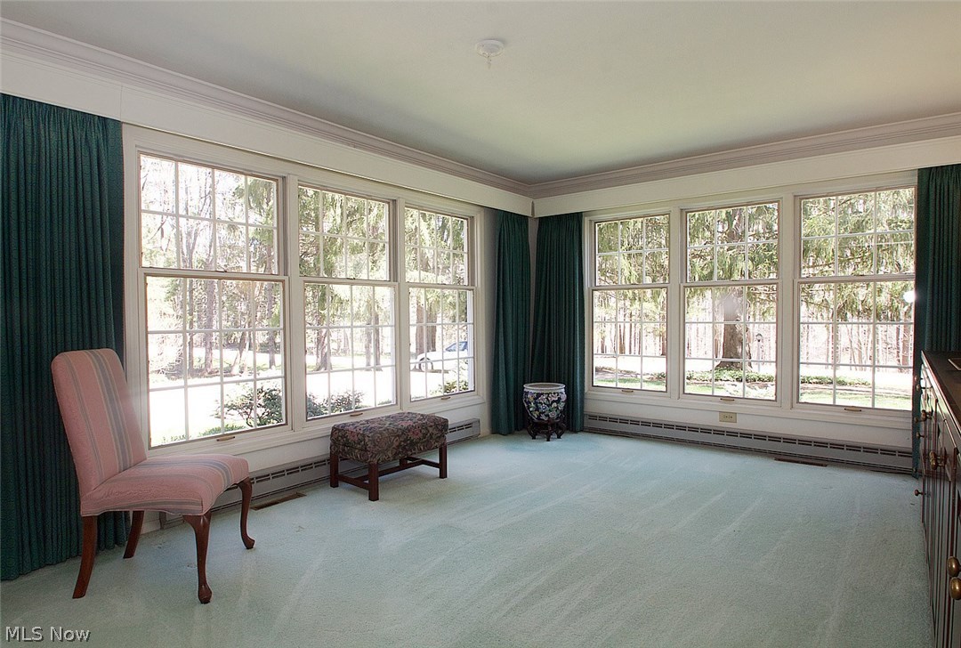 442 Riverview Road Gates Mills, OH 44040 - Photo 2 of 29 Wonderful Dining room has beautiful views and a custom made, solid cherry built in cabinet with lots of storage.