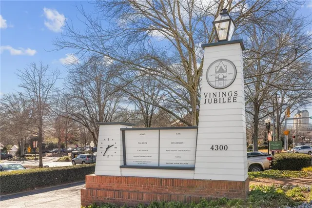 a view of a house with a snow on the road