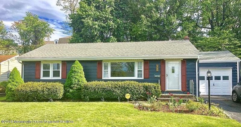 18 Crestview Drive Middletown, NJ 07748 - Photo 1 of 22 front view of a house with a yard