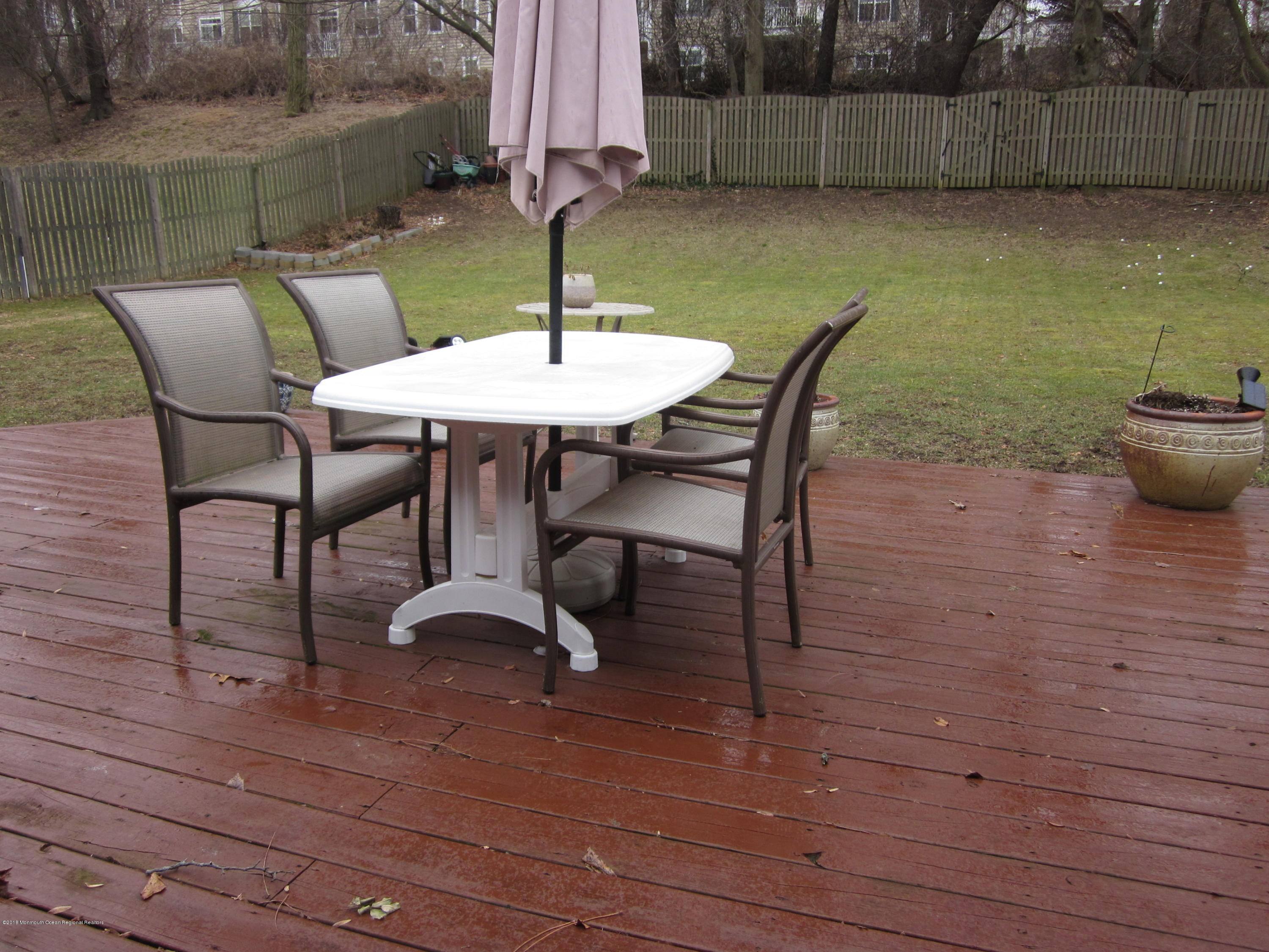 18 Crestview Drive Middletown, NJ 07748 - Photo 19 of 22 a view of a backyard with furniture