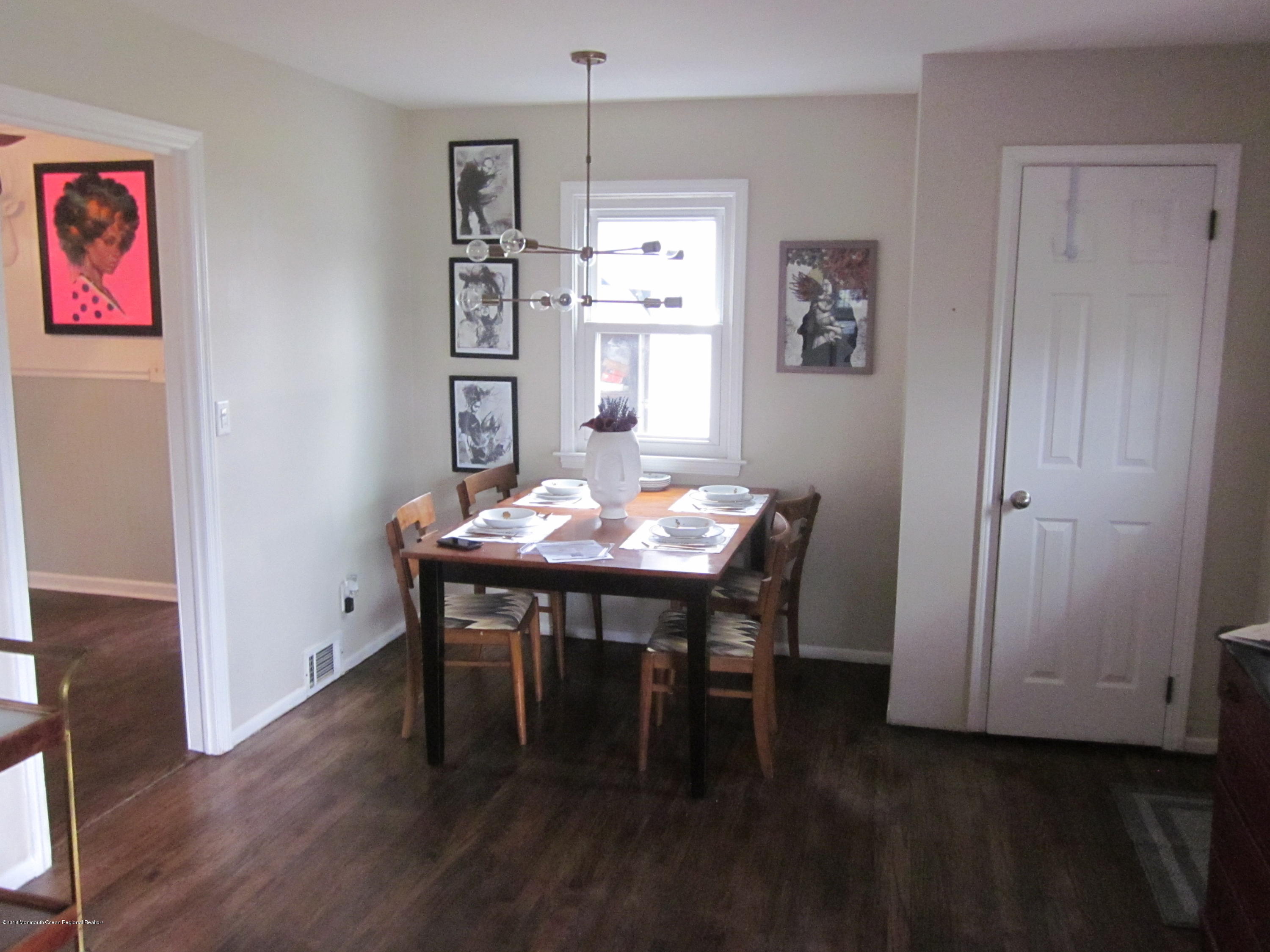 18 Crestview Drive Middletown, NJ 07748 - Photo 6 of 22 a view of a dining room with furniture and wooden floor
