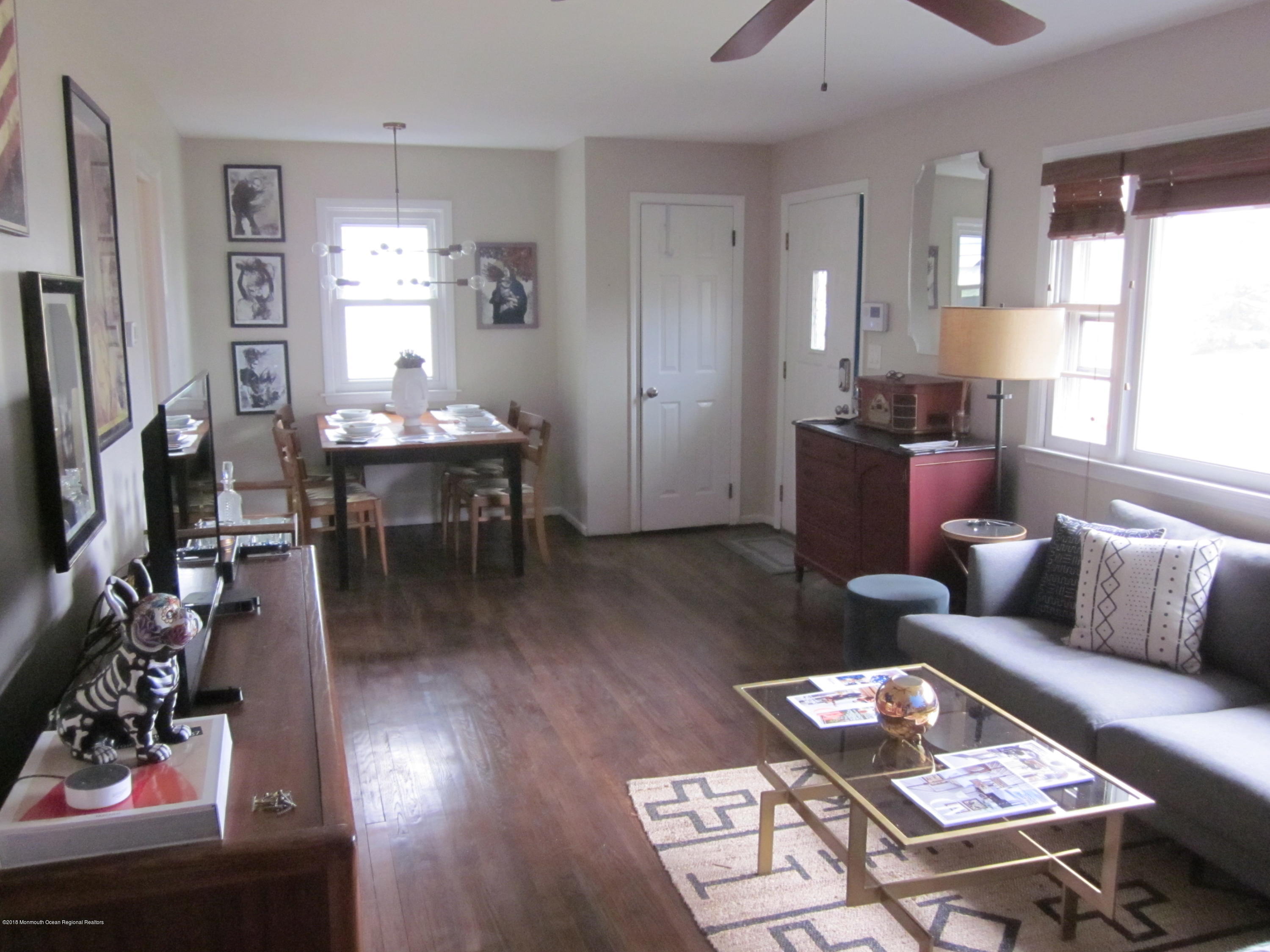 18 Crestview Drive Middletown, NJ 07748 - Photo 7 of 22 a living room with furniture and a flat screen tv