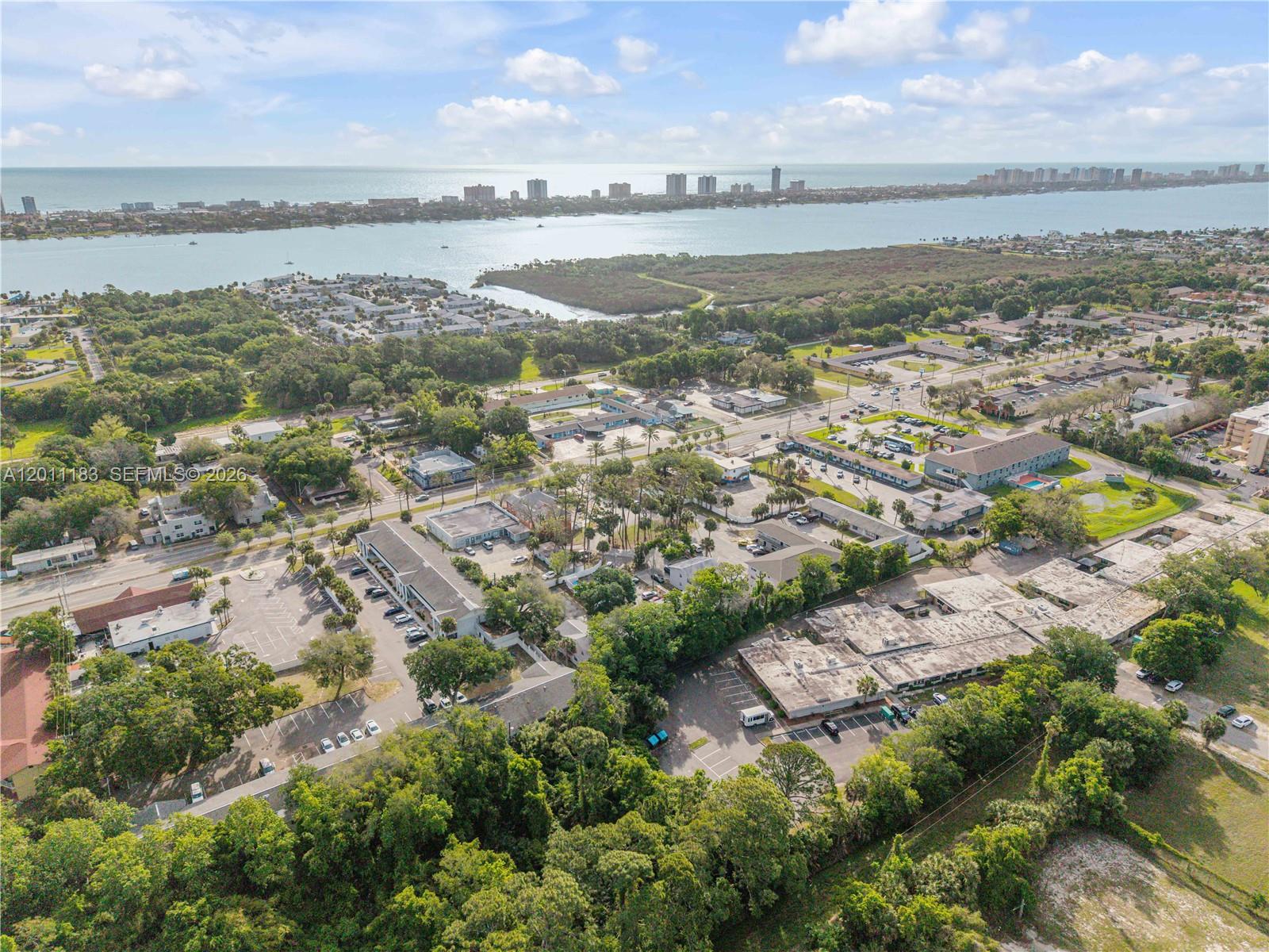 1208 South Ridgewood Avenue Daytona Beach, FL 32114 - Photo 22 of 27 an aerial view of residential building and ocean