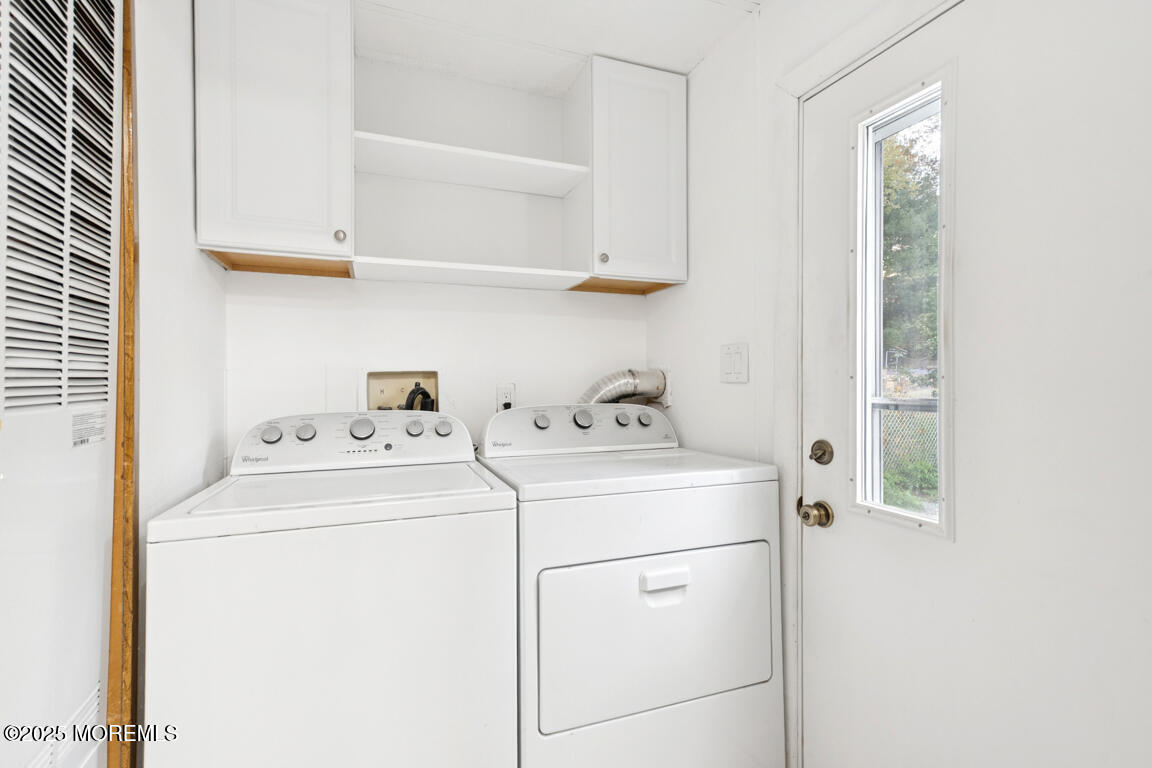 5 Fallow Drive Manalapan, NJ 07726 - Photo 12 of 24 a utility room with dryer and washer