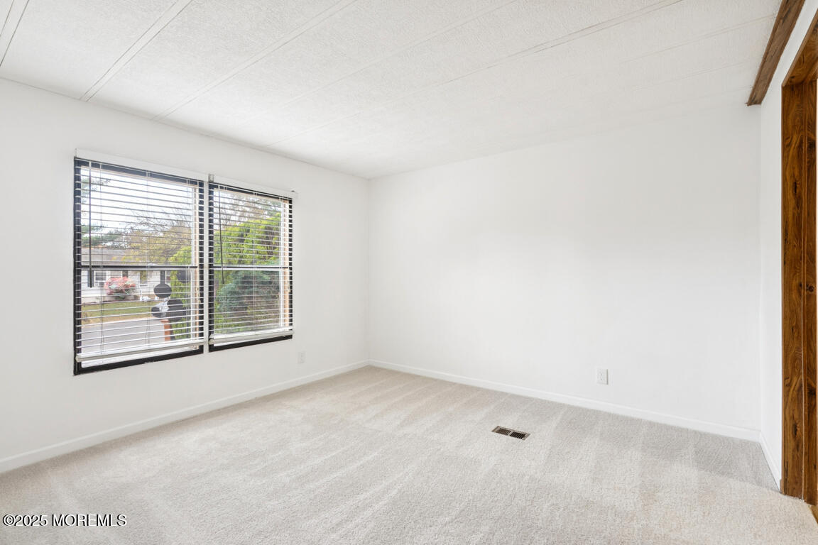 5 Fallow Drive Manalapan, NJ 07726 - Photo 18 of 24 an empty room with a window