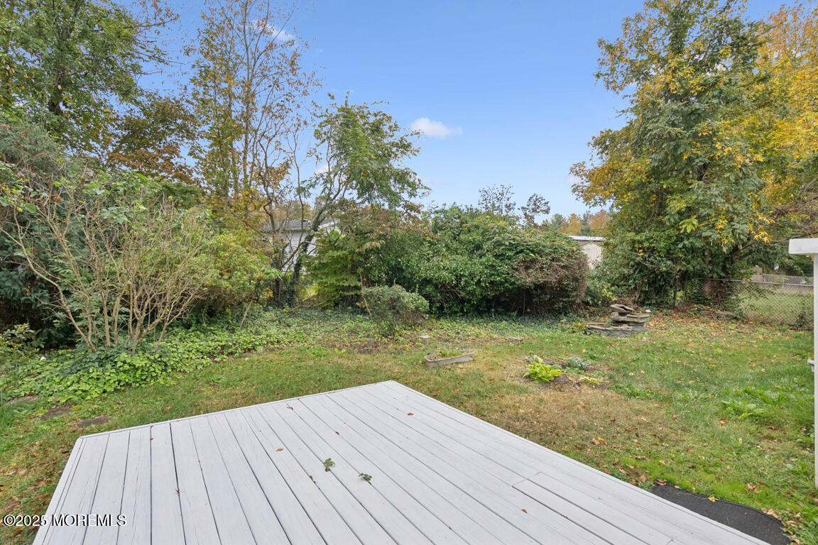 5 Fallow Drive Manalapan, NJ 07726 - Photo 22 of 24 a view of a wooden deck
