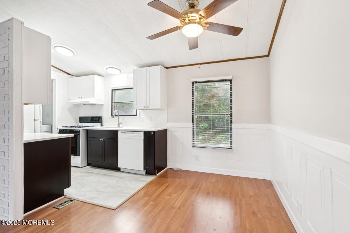 5 Fallow Drive Manalapan, NJ 07726 - Photo 7 of 24 a view of a kitchen with wooden floor and a window