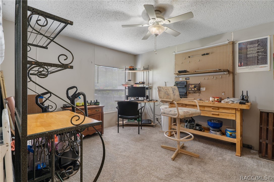7927 West Cyprian Court Homosassa, FL 34448 - Photo 27 of 40 a view of a workspace with furniture