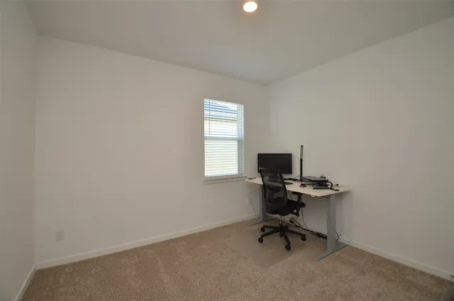 a view of workspace with a window