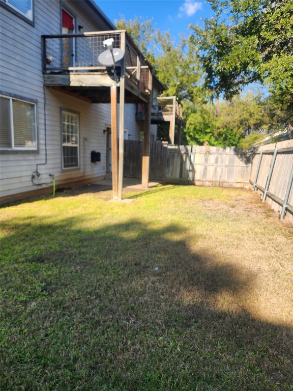 3102 Northwest Boulevard, Unit A Georgetown, TX 78628 - Photo 8 of 9 a view of a house with a yard