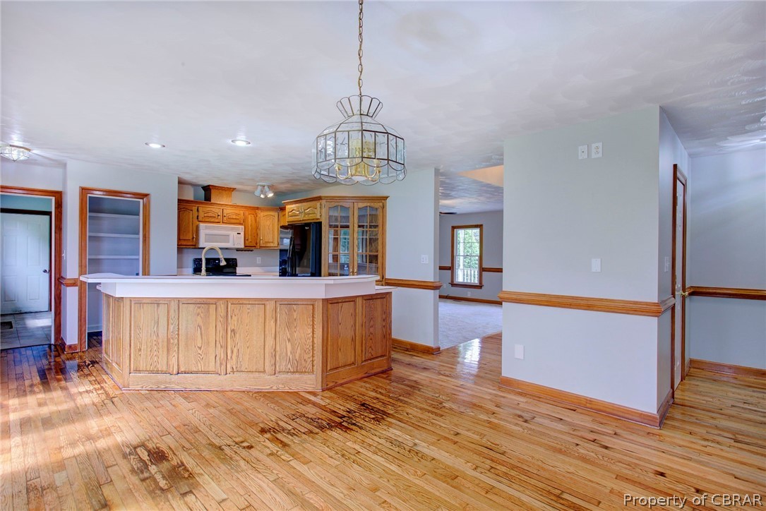 140 Mill Point Road Hudgins, VA 23076 - Photo 21 of 47 a view of kitchen with cabinets and window