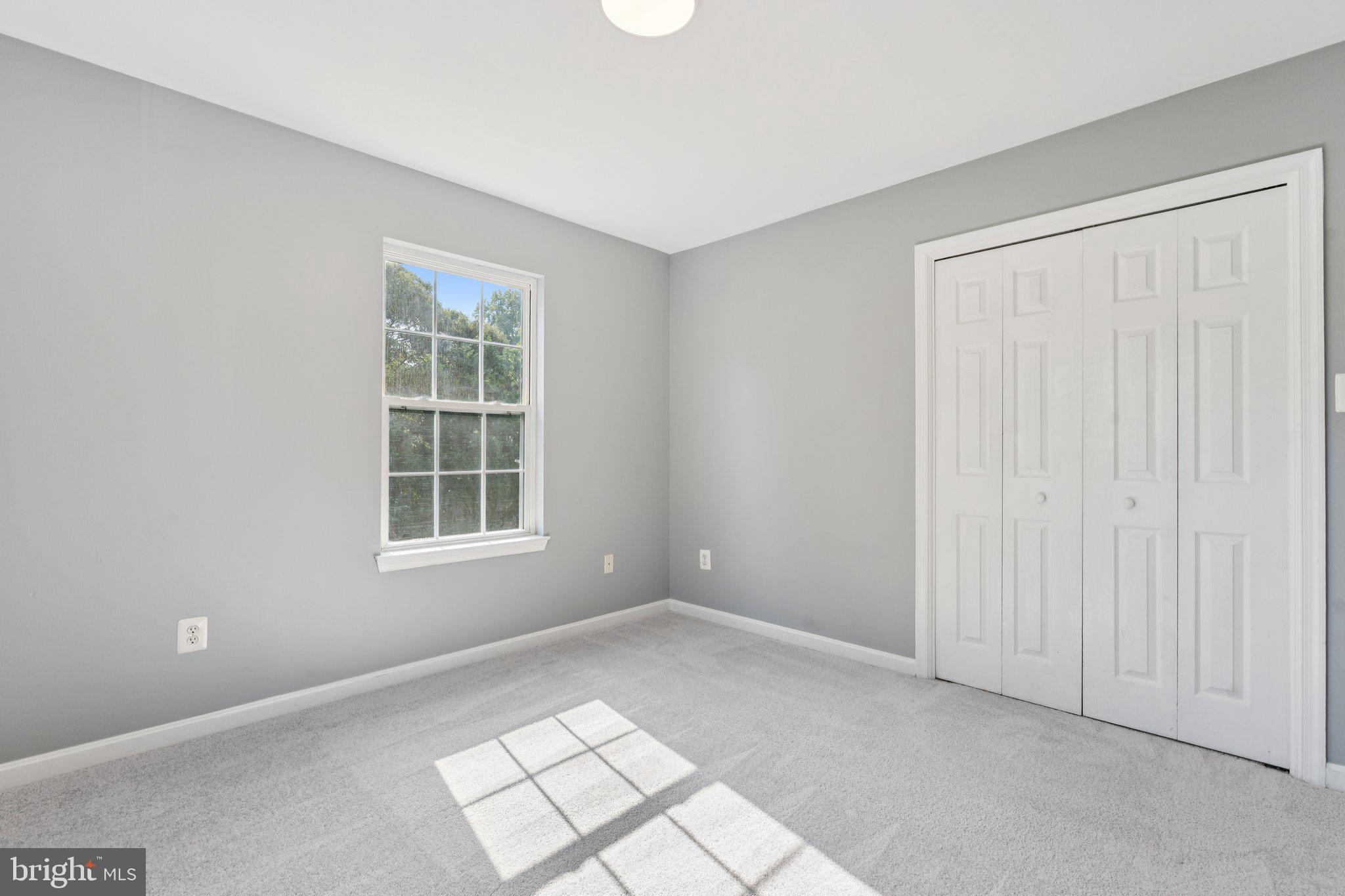 2050 Horace Ward Road Owings, MD 20736 - Photo 25 of 39 an empty room with windows