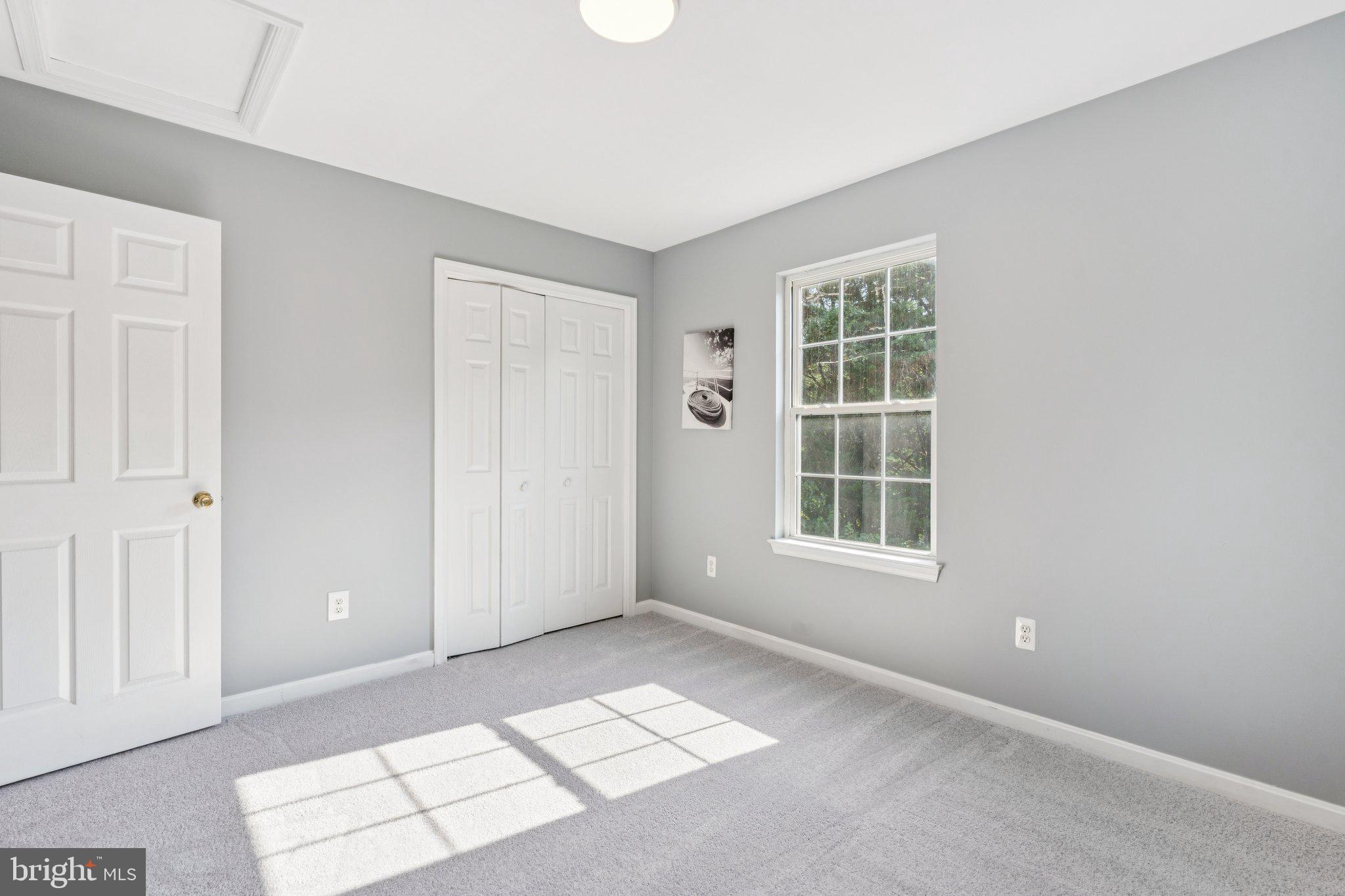 2050 Horace Ward Road Owings, MD 20736 - Photo 26 of 39 an empty room with windows