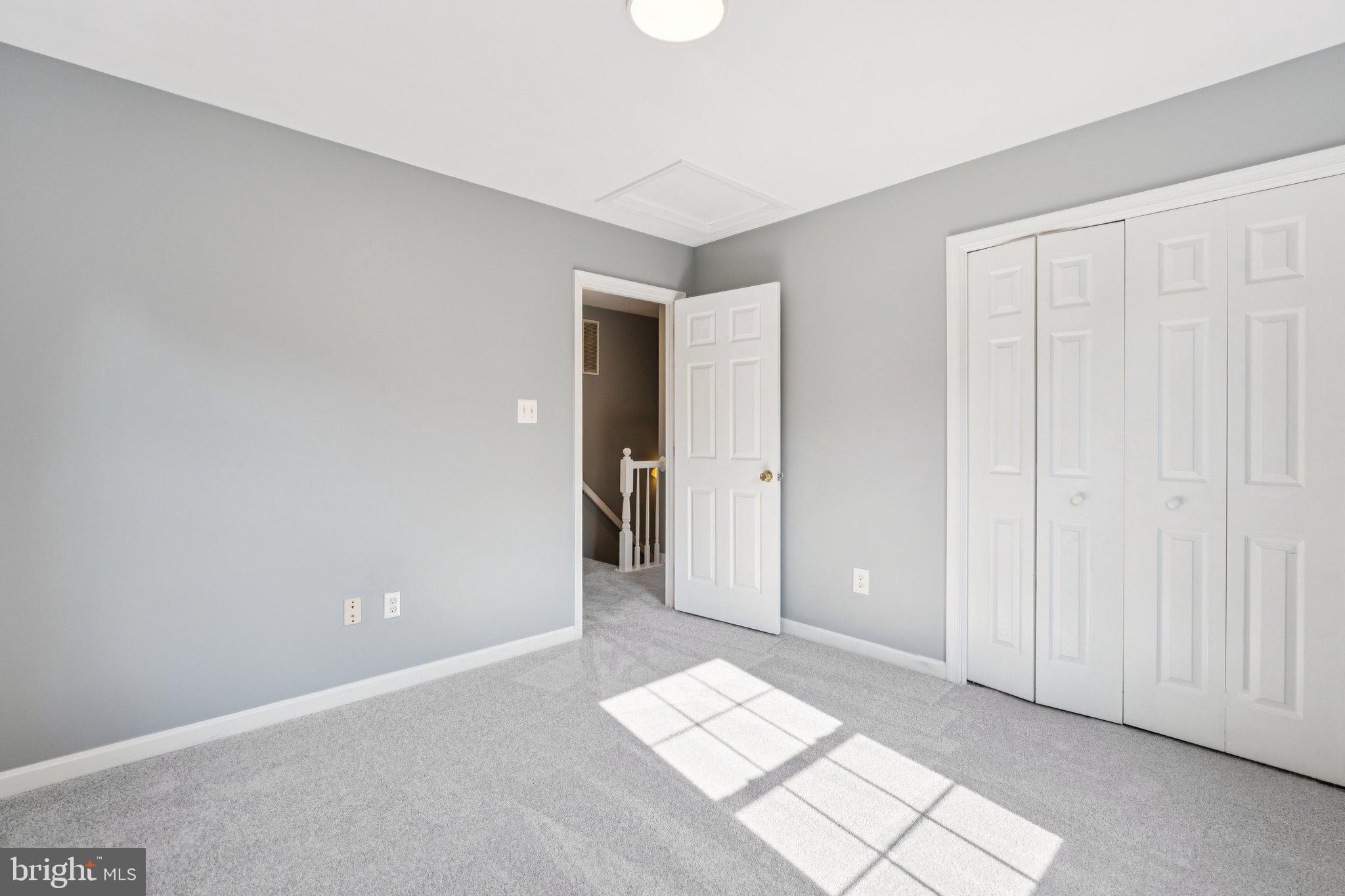 2050 Horace Ward Road Owings, MD 20736 - Photo 27 of 39 an empty room with windows and closet