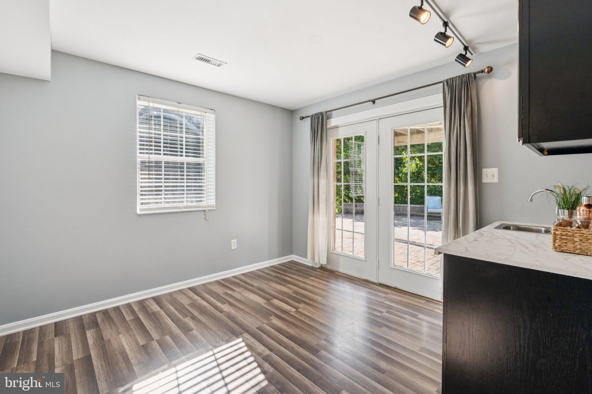 2050 Horace Ward Road Owings, MD 20736 - Photo 32 of 39 a view of a bedroom with wooden floor and balcony