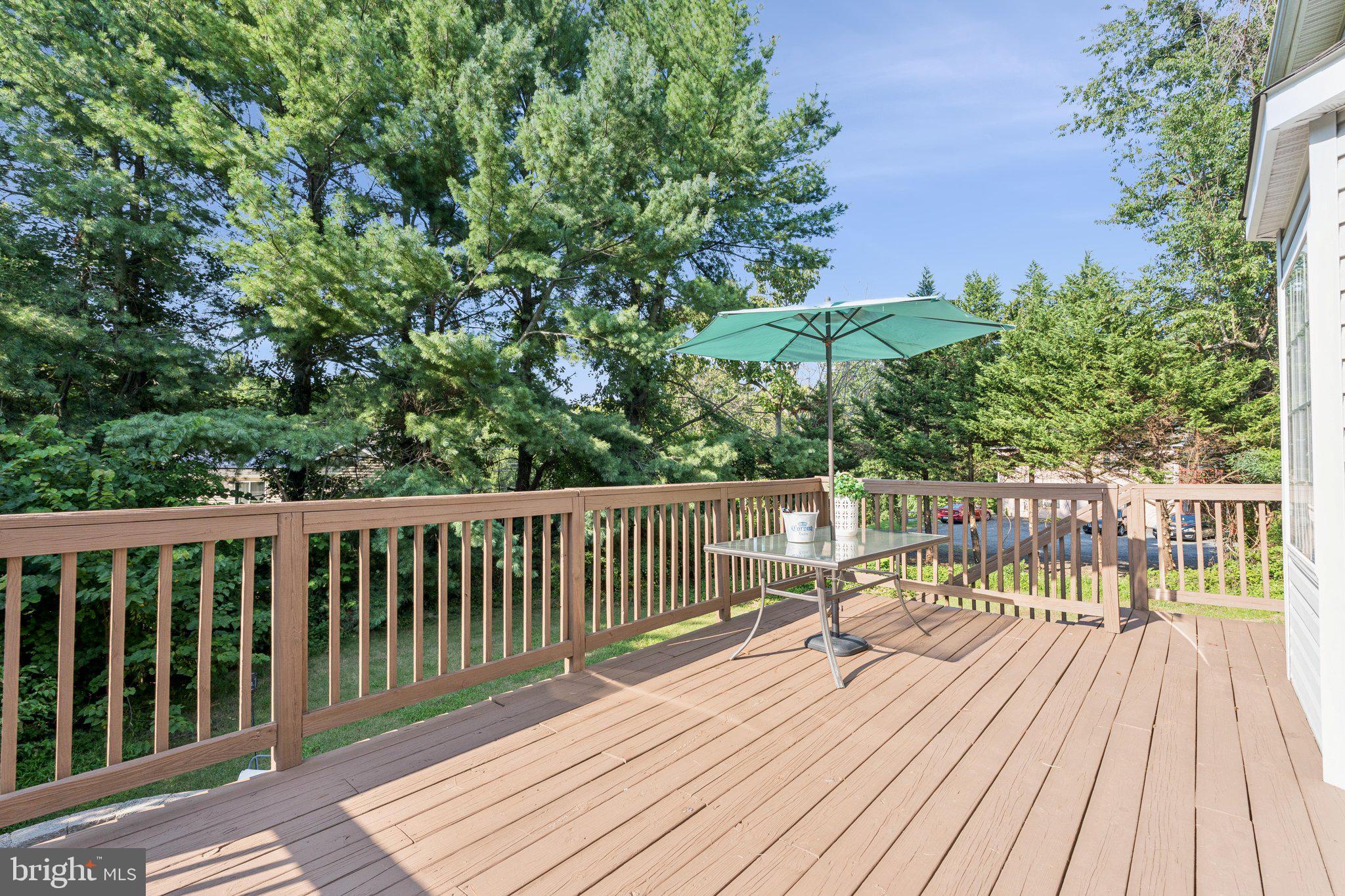 2050 Horace Ward Road Owings, MD 20736 - Photo 35 of 39 a view of balcony with wooden floor and fence