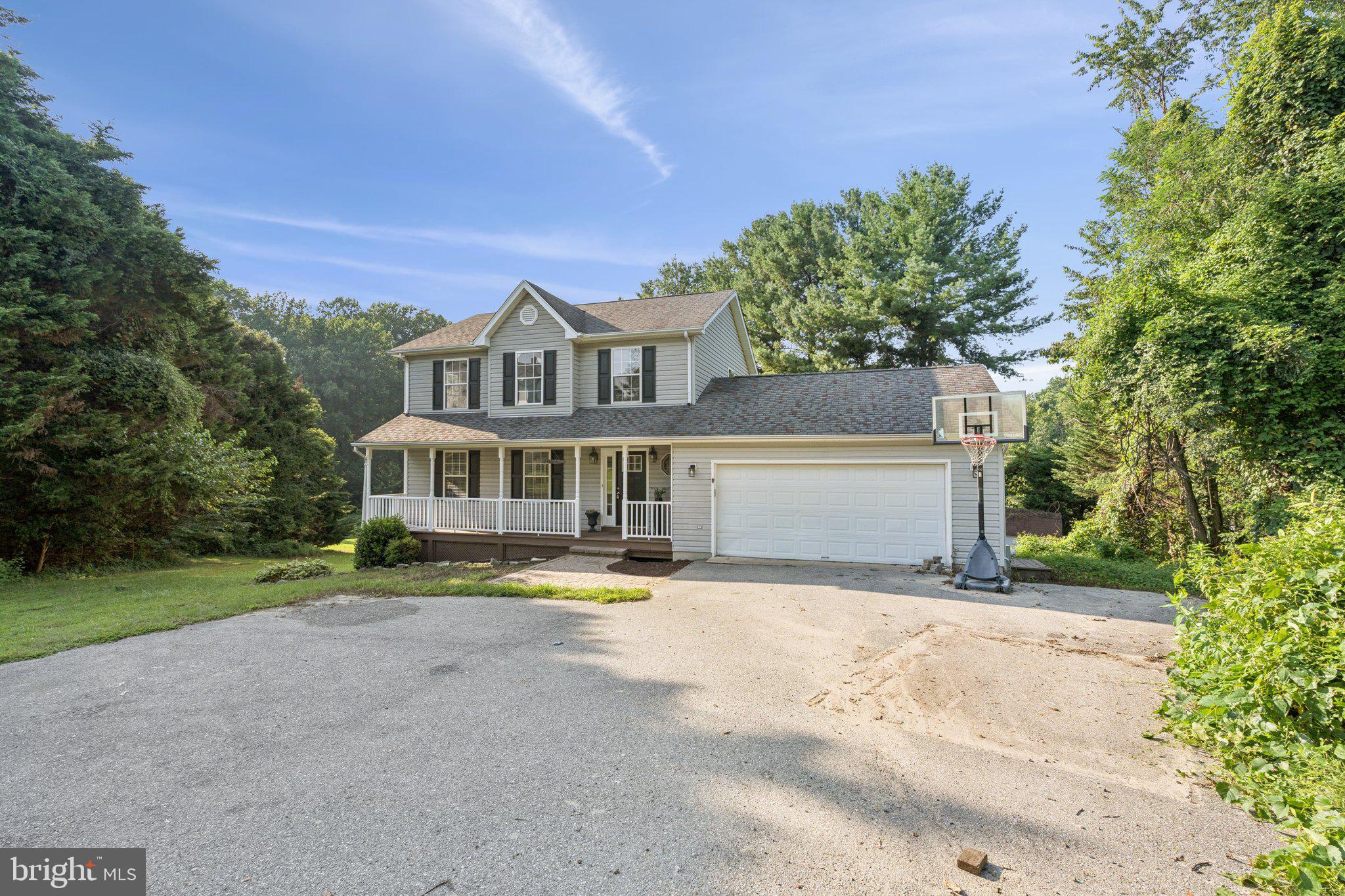 2050 Horace Ward Road Owings, MD 20736 - Photo 39 of 39 a view of house with outdoor space and swimming pool
