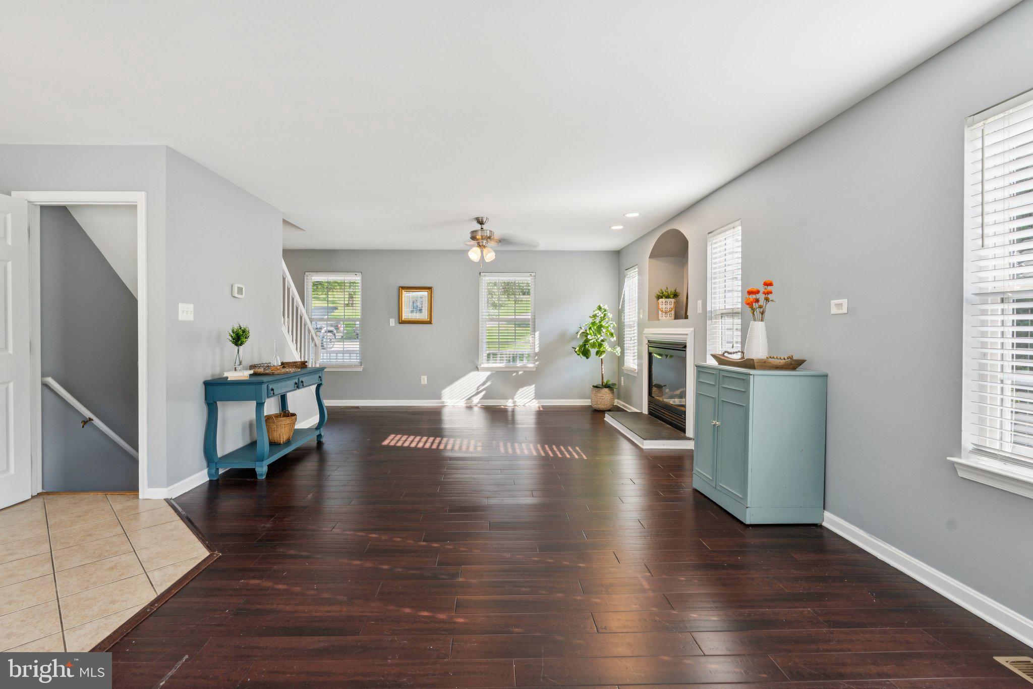 2050 Horace Ward Road Owings, MD 20736 - Photo 6 of 39 a living room with furniture and a wooden floor