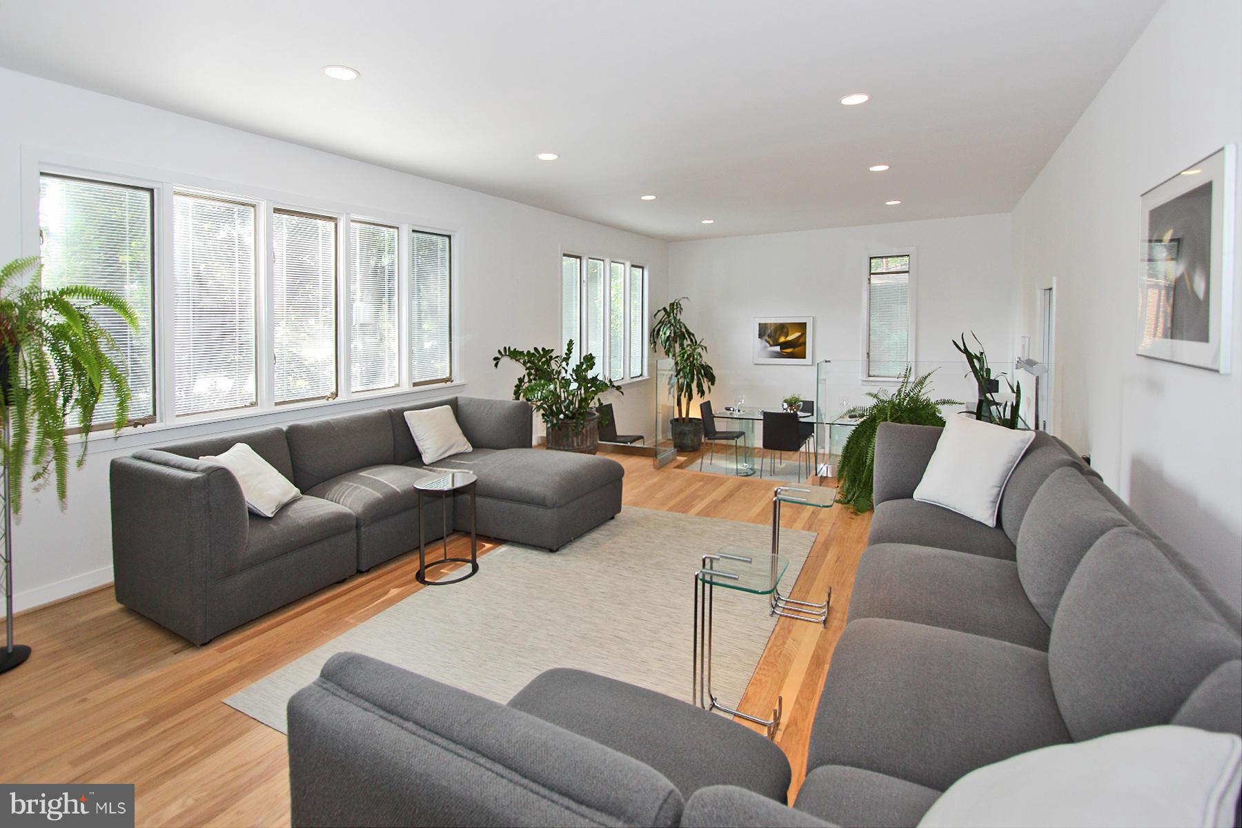 11433 Hook Road Reston, VA 20190 - Photo 4 of 29 a living room with furniture and a large window