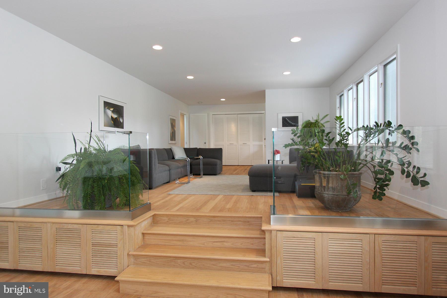 11433 Hook Road Reston, VA 20190 - Photo 6 of 29 a living room with furniture potted plant and a window