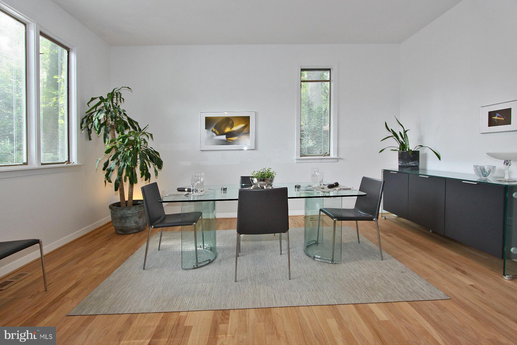 11433 Hook Road Reston, VA 20190 - Photo 7 of 29 a living room with furniture potted plant and a window