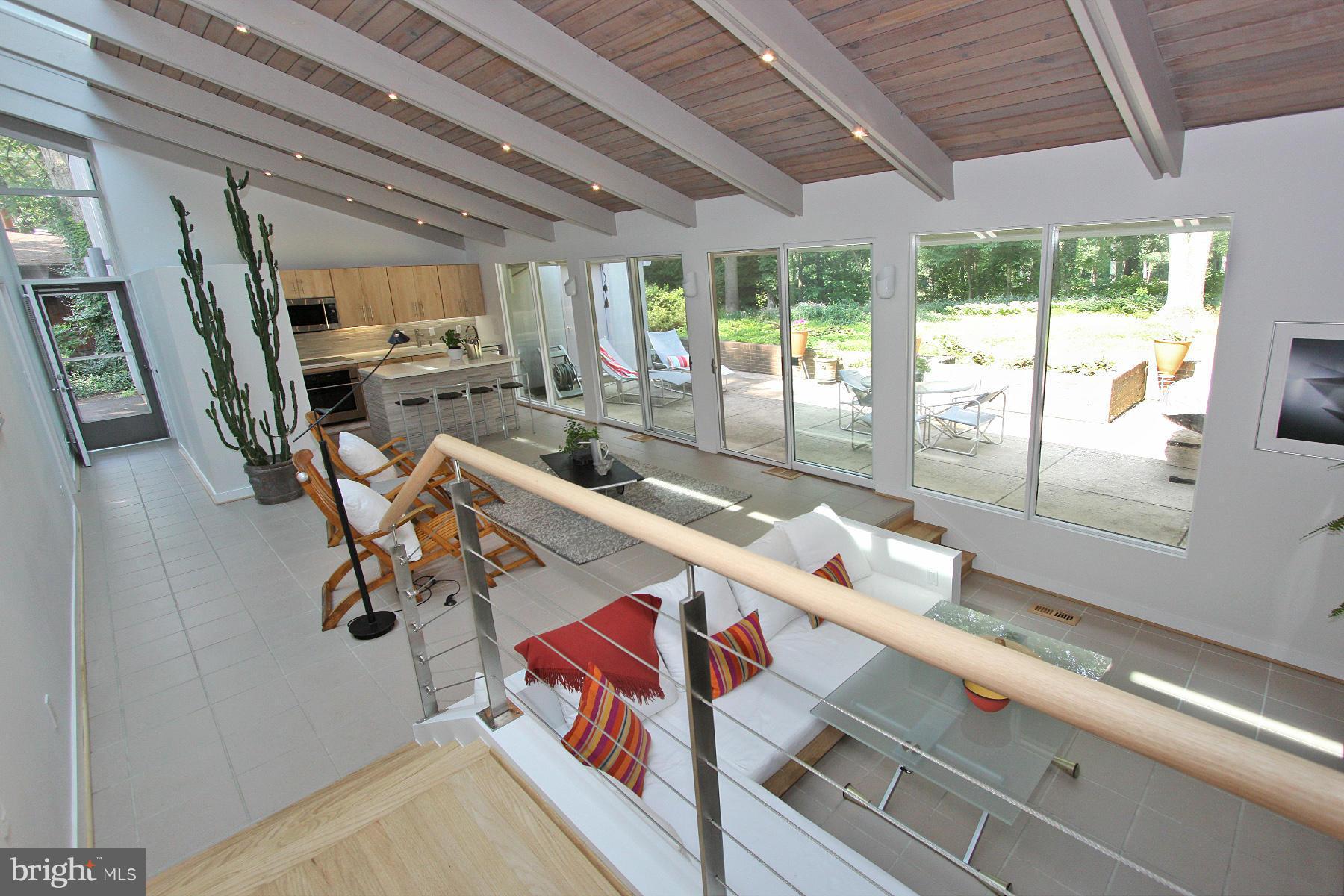 11433 Hook Road Reston, VA 20190 - Photo 9 of 29 a room with gym equipment and a large window