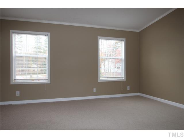 128 Northside View Roxboro, NC 27574 - Photo 3 of 15 Master bedroom with new carpet and paint, walk-in closet