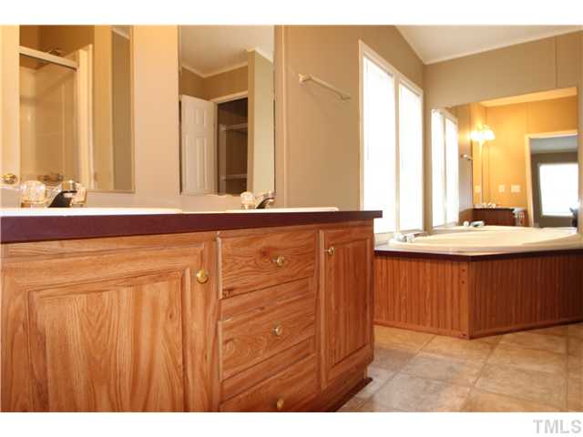 128 Northside View Roxboro, NC 27574 - Photo 4 of 15 Master spa with dual vanities, garden tub, separate shower