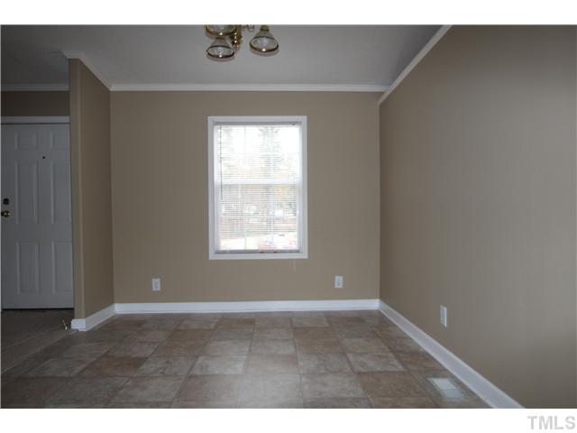 128 Northside View Roxboro, NC 27574 - Photo 8 of 15 Dining room with new vinyl flooring and freshly painted