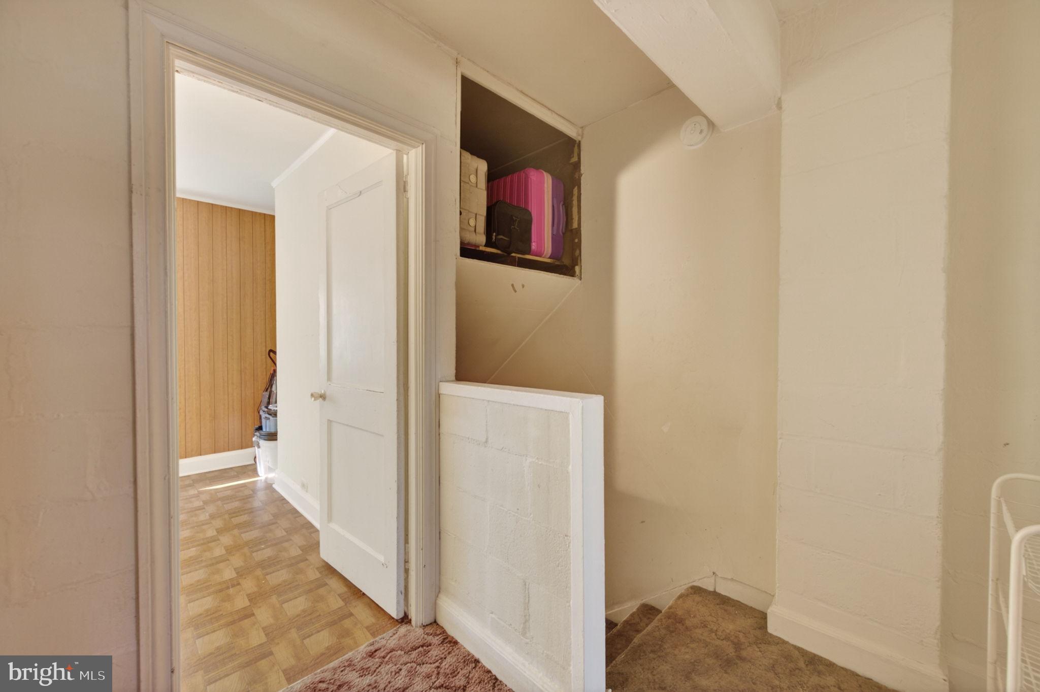 952 Armistead Way Baltimore, MD 21205 - Photo 10 of 13 a view of a hallway with wooden floor and closet